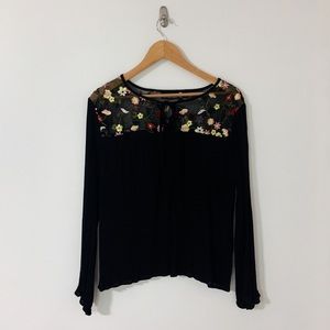 Black shirt with floral embroidery